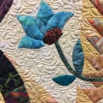 "Wedding Rings and Flowers" pieced by Carolyn Stine and quilted by Maureen Mueller at MQX Midwest 2016
