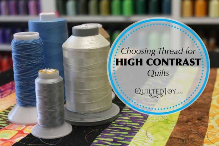 Quilters make many choices when quilting their quilts. Here, Angela discusses how to pick the perfect thread to quilt a high-contrast quilt.