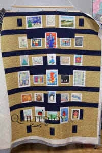 This work of art is made up of artwork printed on fabric "blocks" which were made into a top. See how Angela quilted it to bring out the art!