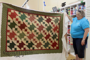 Nancy's quilted quilt with civil war reproduction fabrics. Quilted at Quilted Joy