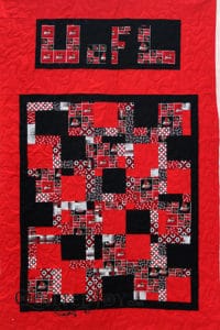 This quilt, made by Karee for a grandchild, was all about the U of L Cardinals. Of course, I had to use Glide in the color Cardinal to quilt it!