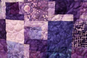 Gorgeous purple batiks quilt