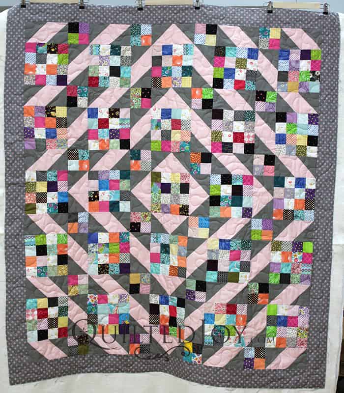 Anita took the Sunny Skies Quilt pattern and made it her own! She brought this super cute scrappy quilt to Angela Huffman for some simple meander quilting.