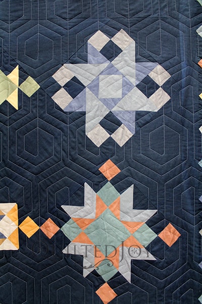 Cheri is still a new quilter, but she's making some beautiful quilts! She asked me to quilt this gorgeous sampler with a geometric edge to edge quilting design. The final results are stunning!