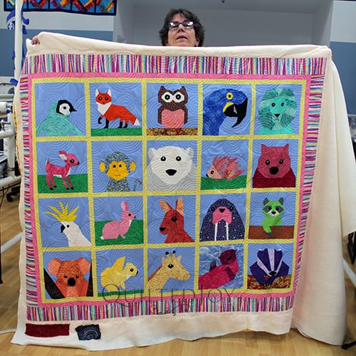 Debbie's paper pieced Animals quilt with blocks from Quiet Play Designs