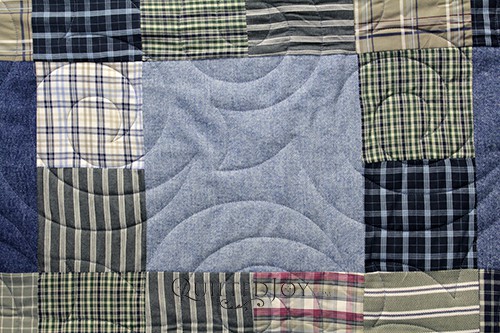 Helen made this beautiful memorial quilt. It is made up of a grandfather's blue jeans and plaid shirts. It is quilted with the Turbulance pantograph.