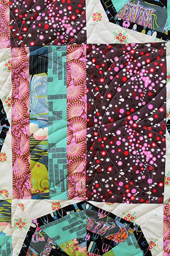 Linda made this playful Spider web quilt for her granddaughter and asked me to quilt it with an edge to edge design. We found the perfect design that carried that spiderweb quilt theme!
