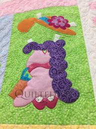 Dress Up Time Applique block designed by Amy Bradley, longarm machine quilting by Angela Huffman