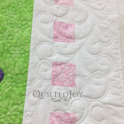 Angela Huffman's longarm machine quilted Garden Gate Feather