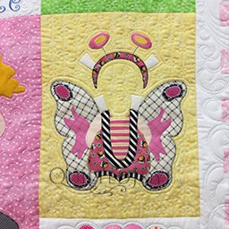 My Butterfly Costume applique pattern by Amy Bradley and machine quilting by Angela Huffman