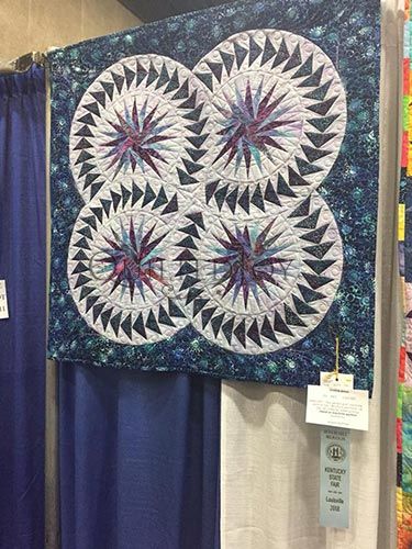 Seasonal Gatherings Quilt pieced by Debbie D and longarm machine quilted by Angela Huffman at the Ky State Fair