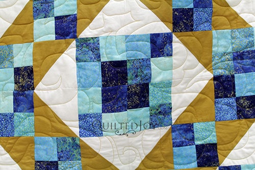 Cascade Pantograph on Judy's Sunny Skies Quilt