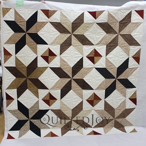 Continuous Curves or Line Dancing Quilting Design on a Big North Star Quilt