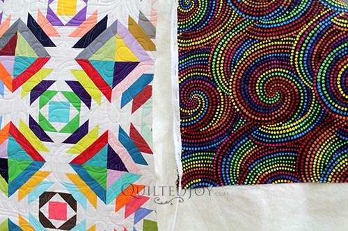 Valerie's Rainbow Pineapple Block Quilt and her Rainbow Dot Swirls Backing Fabric