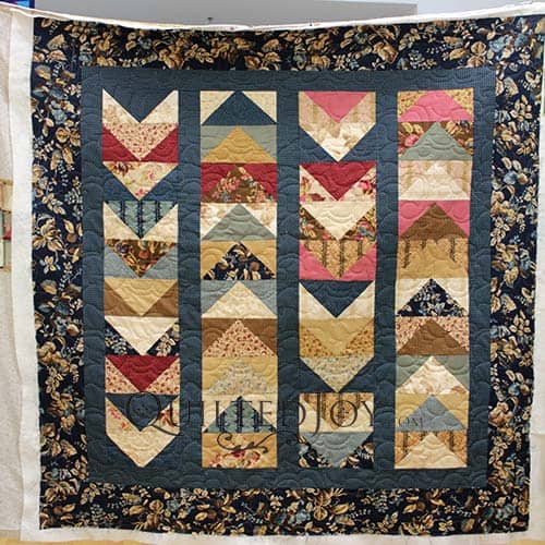 Danielle Made this Flying Geese Quilt with a Layer Cake