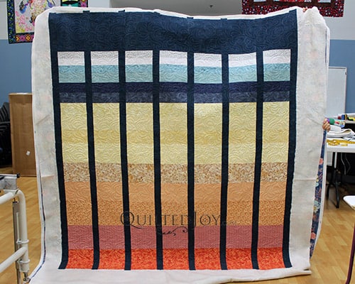 Amanda's Color Gradation Quilt after longarm quilting at Quilted Joy