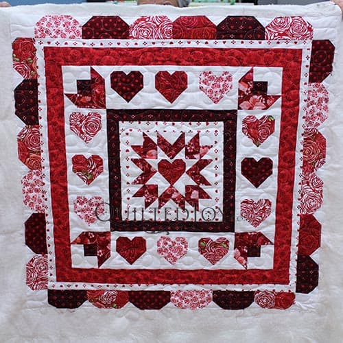 Colleen's Hearts Quilt after her longarm machine rental at Quilted Joy
