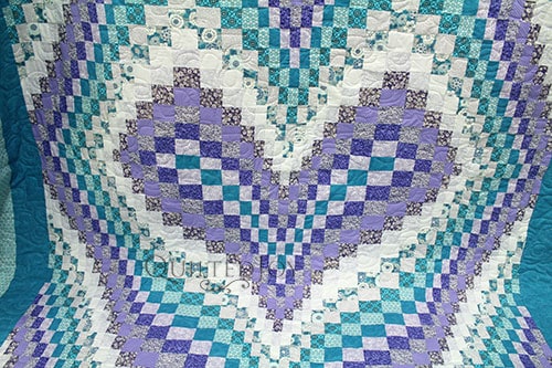 Linda's Bargello Heart Quilt after her longarm machine rental at Quilted Joy
