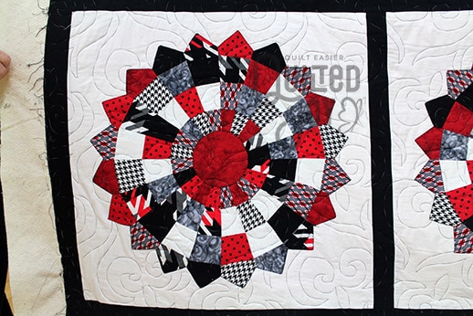 Judy's U of L inspired quilt after longarm quilting at Quilted Joy