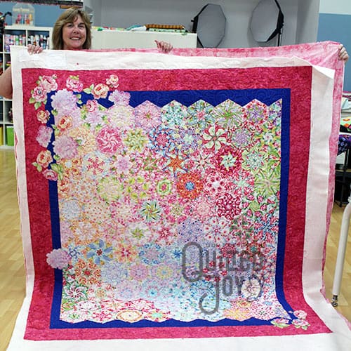 Cheri's One Block Wonder quilt after renting a longarm quilting machine at Quilted Joy