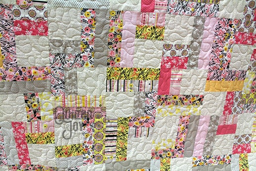 Kim's Split Rain Fence Quilt after renting a longarm quilting machine at Quilted Joy