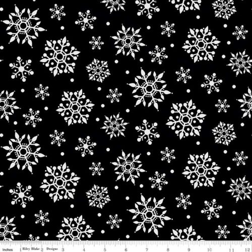 image of Gnome for Christmas - Black Snowflakes 43" Wide Flannel Fabric with white snowflakes on a black background
