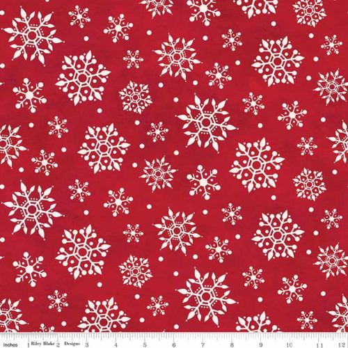image of Gnome for Christmas - Red Snowflakes 43" Wide Flannel Fabric with white snowflakes on a red background