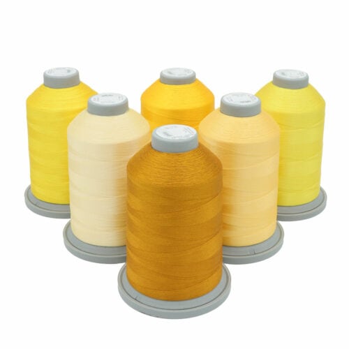 Glide Thread Color Block Bundle - Yellow - six cones of yellow Glide thread on a white background