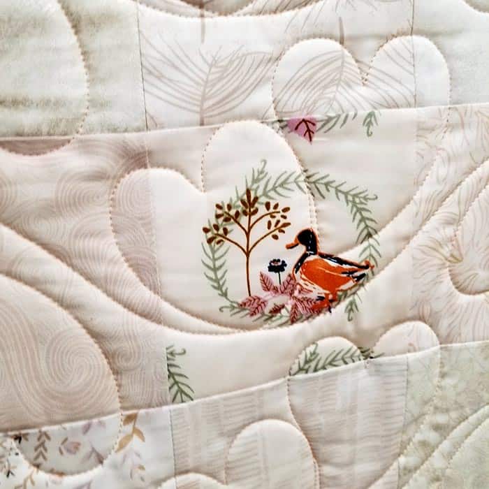 image of duck focal fabric in a heart wedding quilt